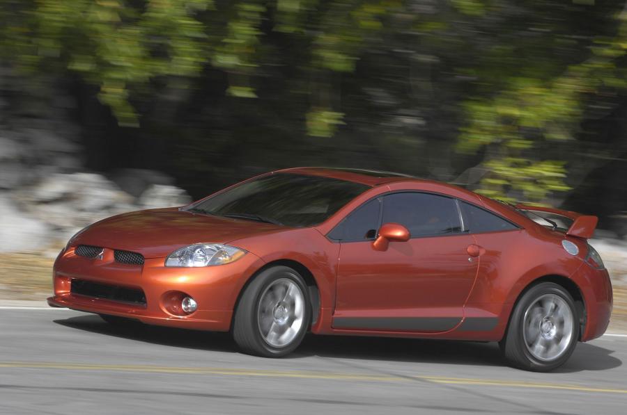  Mitsubishi Eclipse 2009 года  (фото 96 из 205)